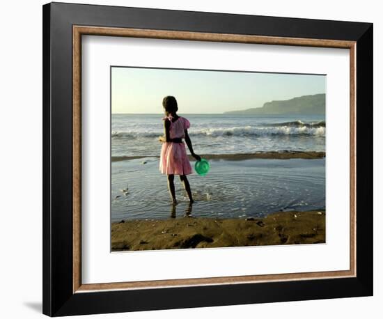 A Girl Walks on the Beach in Jacmel, Haiti, in This February 5, 2001-Lynne Sladky-Framed Photographic Print