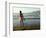 A Girl Walks on the Beach in Jacmel, Haiti, in This February 5, 2001-Lynne Sladky-Framed Photographic Print