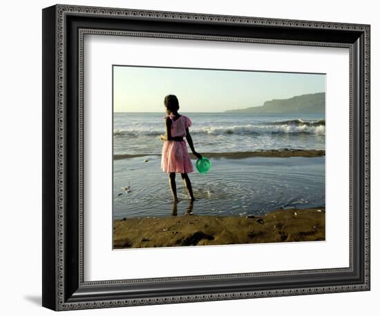 A Girl Walks on the Beach in Jacmel, Haiti, in This February 5, 2001-Lynne Sladky-Framed Photographic Print