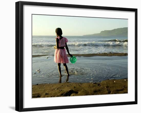 A Girl Walks on the Beach in Jacmel, Haiti, in This February 5, 2001-Lynne Sladky-Framed Photographic Print