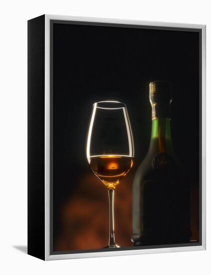 A Glass and a Bottle of Cognac-Armin Faber-Framed Premier Image Canvas