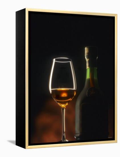 A Glass and a Bottle of Cognac-Armin Faber-Framed Premier Image Canvas