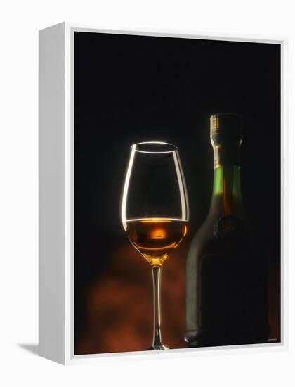 A Glass and a Bottle of Cognac-Armin Faber-Framed Premier Image Canvas