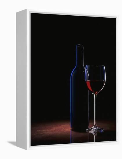 A Glass of Red Wine and a Wine Bottle-Roland Krieg-Framed Premier Image Canvas