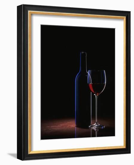 A Glass of Red Wine and a Wine Bottle-Roland Krieg-Framed Photographic Print