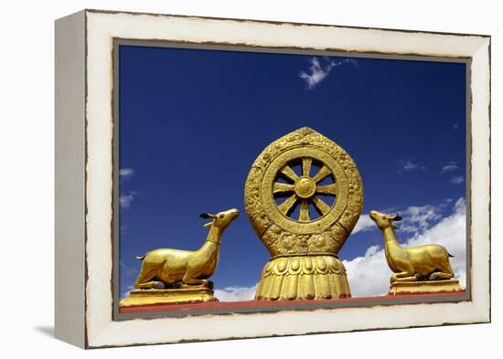 A Golden Dharma Wheel and Deer Sculptures-Simon Montgomery-Framed Premier Image Canvas