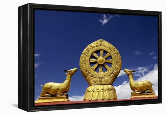 A Golden Dharma Wheel and Deer Sculptures-Simon Montgomery-Framed Premier Image Canvas