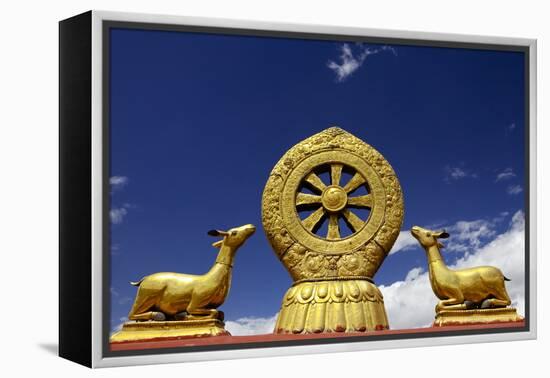 A Golden Dharma Wheel and Deer Sculptures-Simon Montgomery-Framed Premier Image Canvas