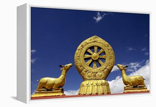 A Golden Dharma Wheel and Deer Sculptures-Simon Montgomery-Framed Premier Image Canvas