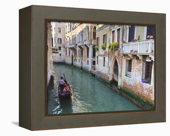 A Gondola on a Canal in Venice, UNESCO World Heritage Site. Veneto, Italy, Europe-Amanda Hall-Framed Premier Image Canvas