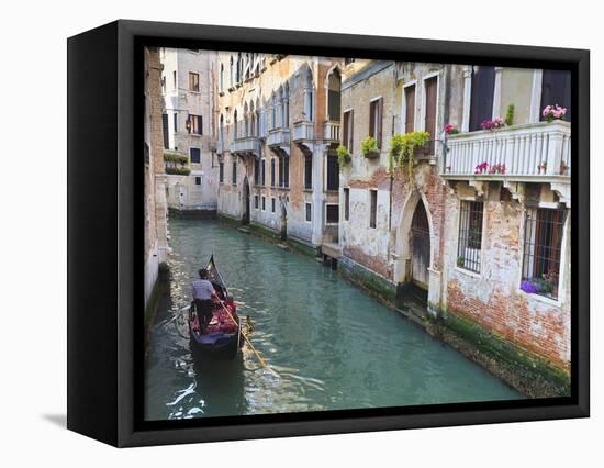 A Gondola on a Canal in Venice, UNESCO World Heritage Site. Veneto, Italy, Europe-Amanda Hall-Framed Premier Image Canvas