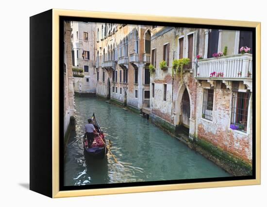 A Gondola on a Canal in Venice, UNESCO World Heritage Site. Veneto, Italy, Europe-Amanda Hall-Framed Premier Image Canvas