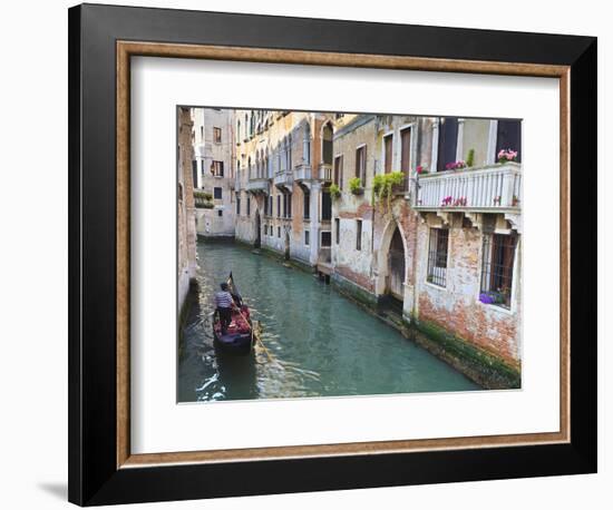 A Gondola on a Canal in Venice, UNESCO World Heritage Site. Veneto, Italy, Europe-Amanda Hall-Framed Photographic Print
