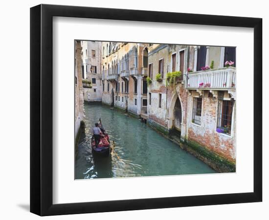 A Gondola on a Canal in Venice, UNESCO World Heritage Site. Veneto, Italy, Europe-Amanda Hall-Framed Photographic Print