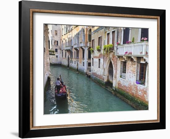 A Gondola on a Canal in Venice, UNESCO World Heritage Site. Veneto, Italy, Europe-Amanda Hall-Framed Photographic Print