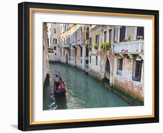 A Gondola on a Canal in Venice, UNESCO World Heritage Site. Veneto, Italy, Europe-Amanda Hall-Framed Photographic Print