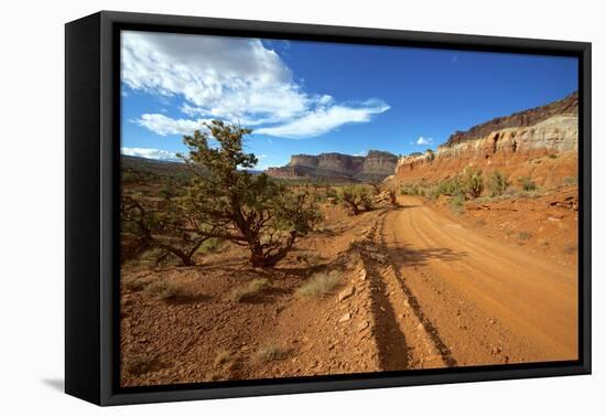 A Gravel Road Skirts the Capitol Reef in Capitol Reef National Park, Utah-Richard Wright-Framed Premier Image Canvas