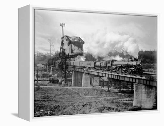 A Great Northern Railway Train on the G.N.R. Bridge across the Lake Washington Ship Canal in Ballar-Ashael Curtis-Framed Premier Image Canvas