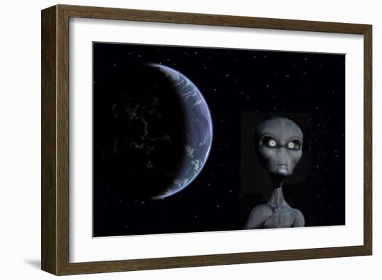 A Grey Alien with Planet Earth in the Background-null-Framed Art Print