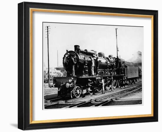 A Group of British Railway Engineers Carrying Out Safety Checks a Steam Locomotive-null-Framed Photographic Print