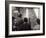 A Group of Scientists Study a Problem by Using Diagrams on a Blackboard-Henry Grant-Framed Photographic Print