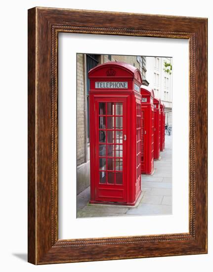 A Group of Typical Red London Phone Cabins-Kamira-Framed Photographic Print