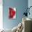 A Group of Typical Red London Phone Cabins-Kamira-Photographic Print displayed on a wall