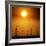 A Group of Wind Turbines are Silhouetted by the Setting Sun-Charlie Riedel-Framed Photographic Print