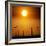 A Group of Wind Turbines are Silhouetted by the Setting Sun-Charlie Riedel-Framed Photographic Print