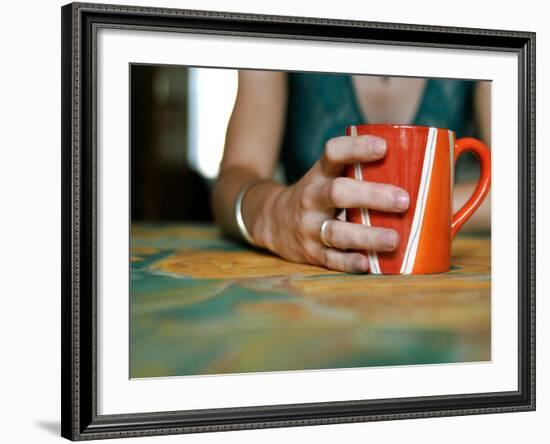 A Hand Holding a Red Mug-Katrin Adam-Framed Photographic Print