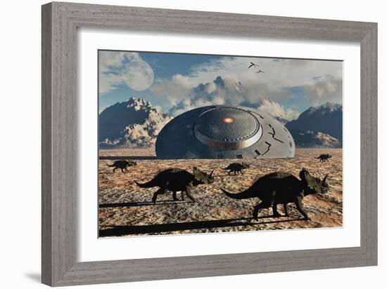 A Herd of Dinosaurs Walk Past a Flying Saucer Lodged into the Ground-null-Framed Art Print