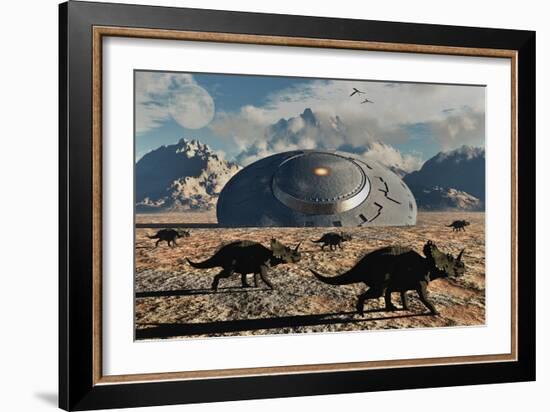 A Herd of Dinosaurs Walk Past a Flying Saucer Lodged into the Ground-null-Framed Art Print