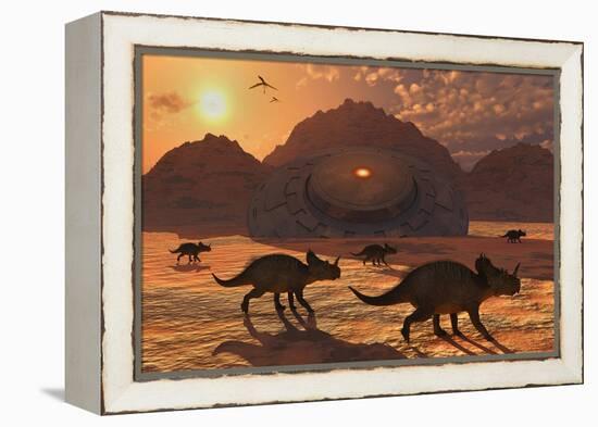 A Herd of Dinosaurs Walk Past a Flying Saucer Lodged into the Ground-null-Framed Stretched Canvas