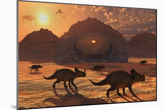 A Herd of Dinosaurs Walk Past a Flying Saucer Lodged into the Ground-null-Mounted Art Print