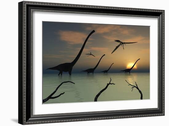 A Herd of Omeisaurus Dinosaurs Walking Through Shallow Waters-Stocktrek Images-Framed Art Print