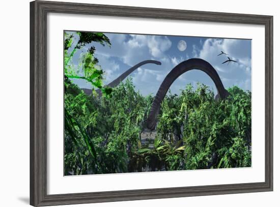 A Herd of Omeisaurus Sauropod Dinosaurs Grazing-null-Framed Art Print