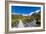 A hiking trail crosses wooden bridge over a creak high up in the mountains, New Zealand-Logan Brown-Framed Photographic Print