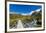 A hiking trail crosses wooden bridge over a creak high up in the mountains, New Zealand-Logan Brown-Framed Photographic Print