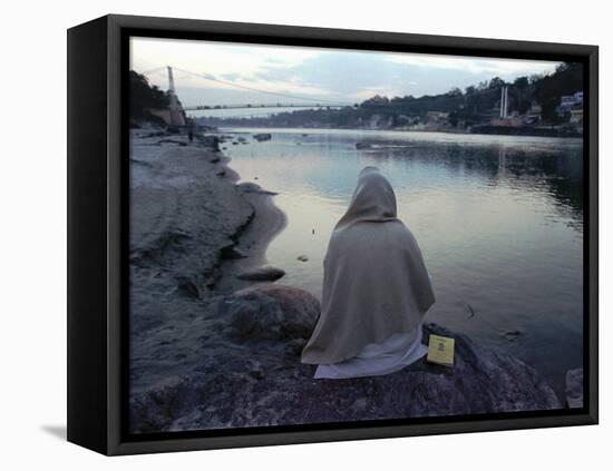 A Hindu Pilgrim Meditates Along the Bank of the Ganges River-null-Framed Premier Image Canvas