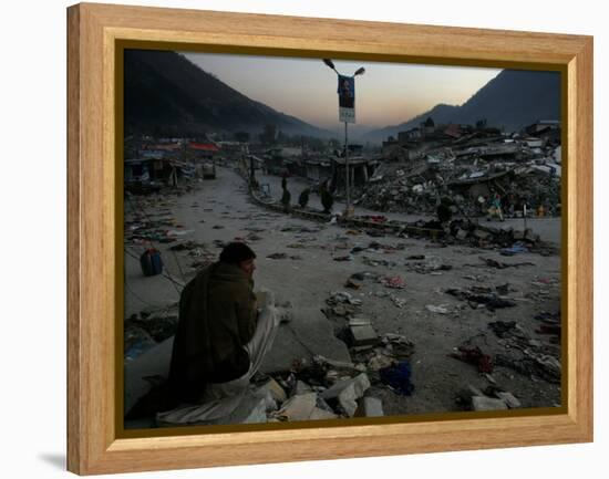 A Homeless Pakistani Earthquake Survivor Sits on the Roadside-null-Framed Premier Image Canvas