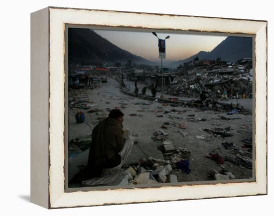 A Homeless Pakistani Earthquake Survivor Sits on the Roadside-null-Framed Premier Image Canvas