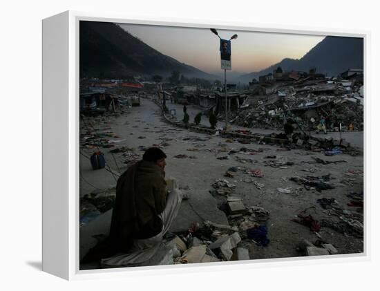 A Homeless Pakistani Earthquake Survivor Sits on the Roadside-null-Framed Premier Image Canvas