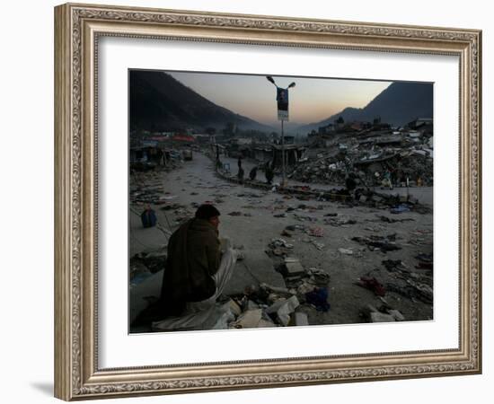 A Homeless Pakistani Earthquake Survivor Sits on the Roadside-null-Framed Photographic Print