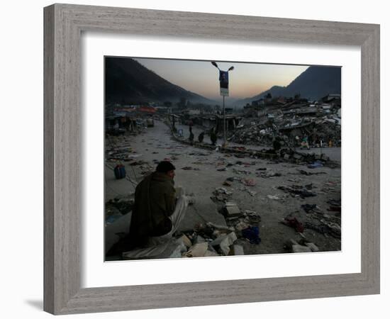 A Homeless Pakistani Earthquake Survivor Sits on the Roadside-null-Framed Photographic Print