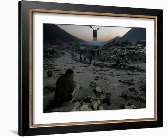 A Homeless Pakistani Earthquake Survivor Sits on the Roadside-null-Framed Photographic Print