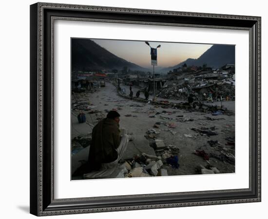 A Homeless Pakistani Earthquake Survivor Sits on the Roadside-null-Framed Photographic Print