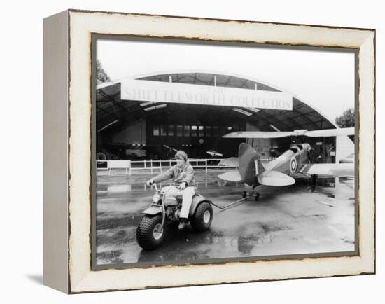 A Honda All Terrain Cycle Pulling a Vintage Biplane, 1982-null-Framed Premier Image Canvas