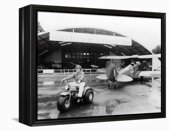 A Honda All Terrain Cycle Pulling a Vintage Biplane, 1982-null-Framed Premier Image Canvas