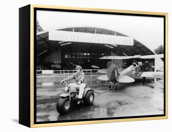 A Honda All Terrain Cycle Pulling a Vintage Biplane, 1982-null-Framed Premier Image Canvas