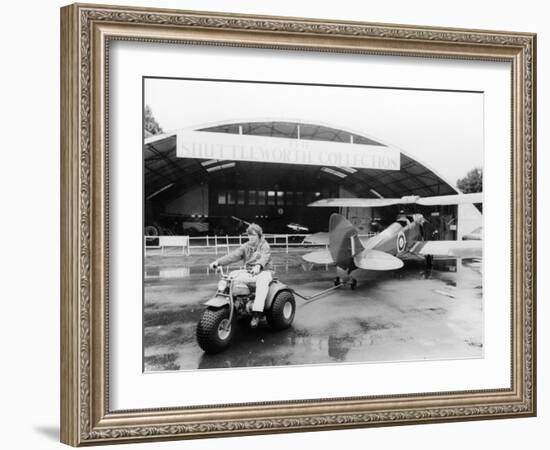 A Honda All Terrain Cycle Pulling a Vintage Biplane, 1982-null-Framed Photographic Print